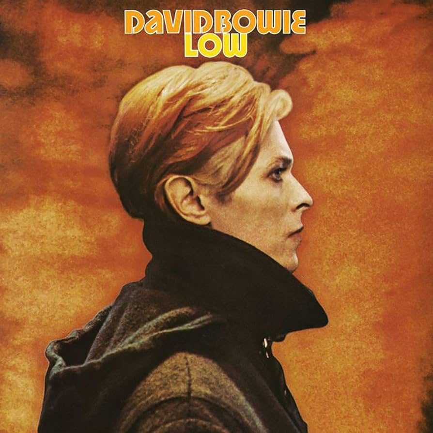 David Bowie - Low Vinyl Record
Album cover with a profile of a person against an orange background, featuring the text 'David Bowie Low'.