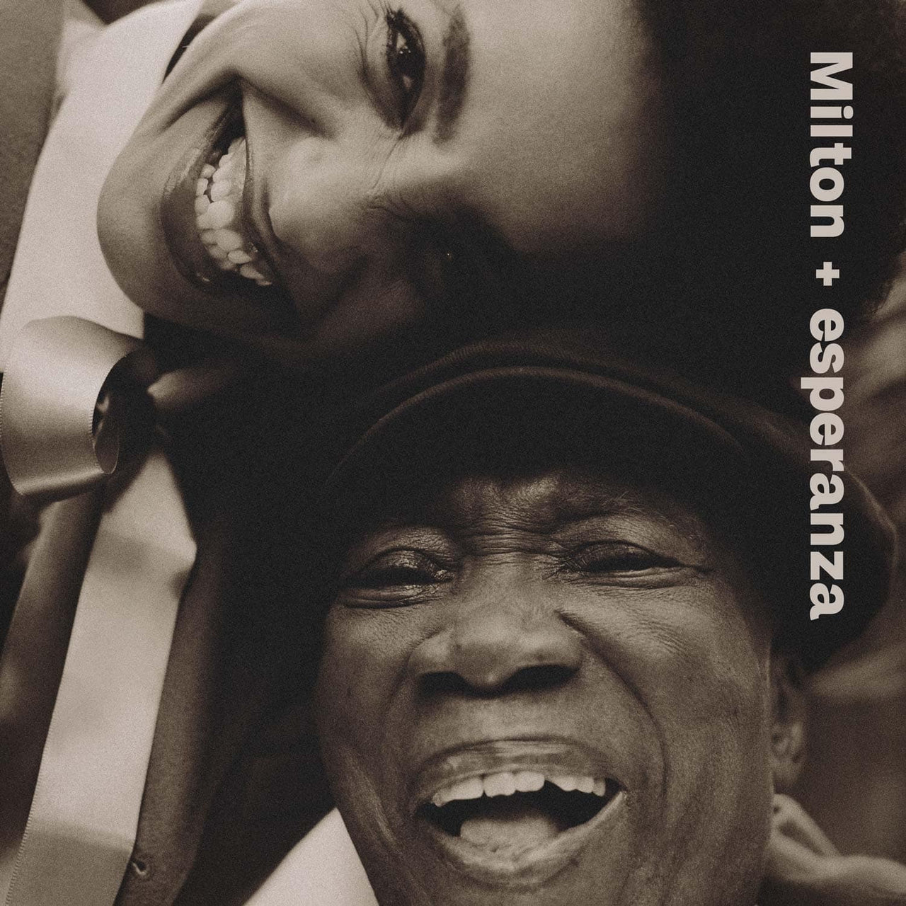 Milton Nascimento & Esperanza Spalding - Milton Esperanza Vinyl Record
Black and white photo of two people laughing with 'Milton + esperanza' text.