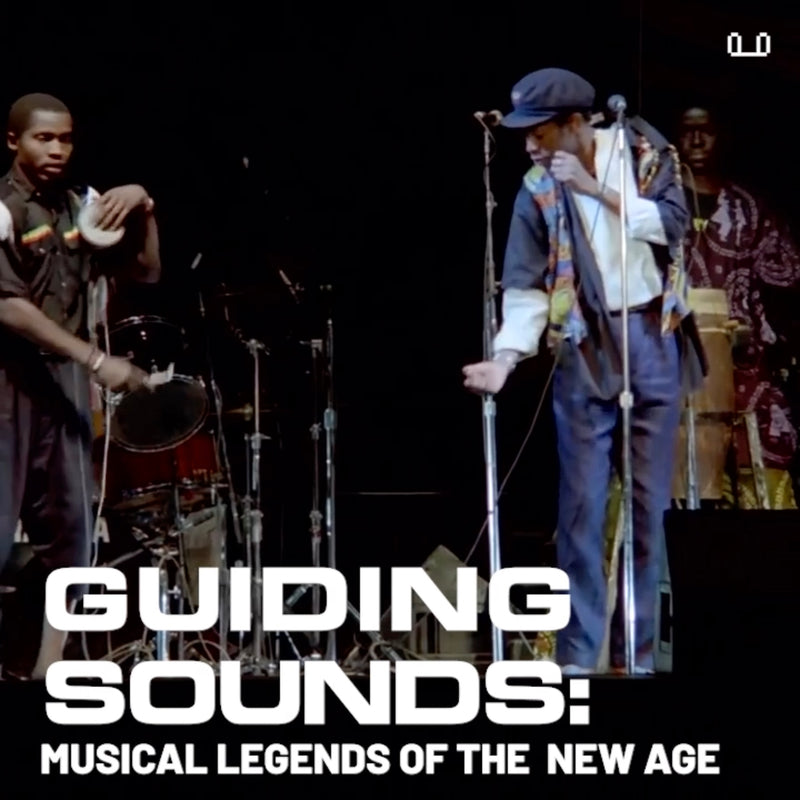  Musicians performing on stage with instruments; text reads "Guiding Sounds: Musical Legends of the New Age.