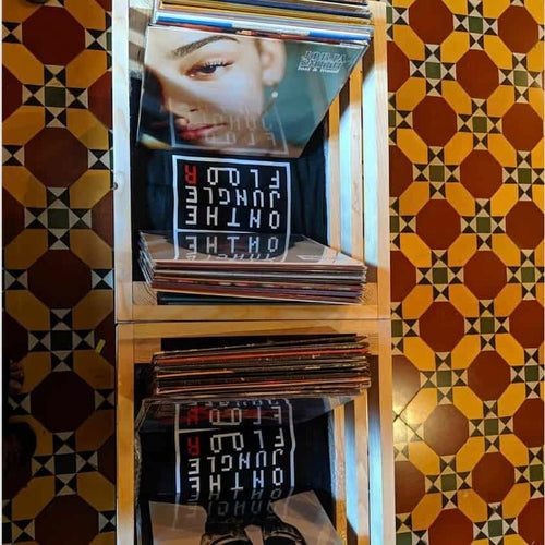 vinyls stacked in crates