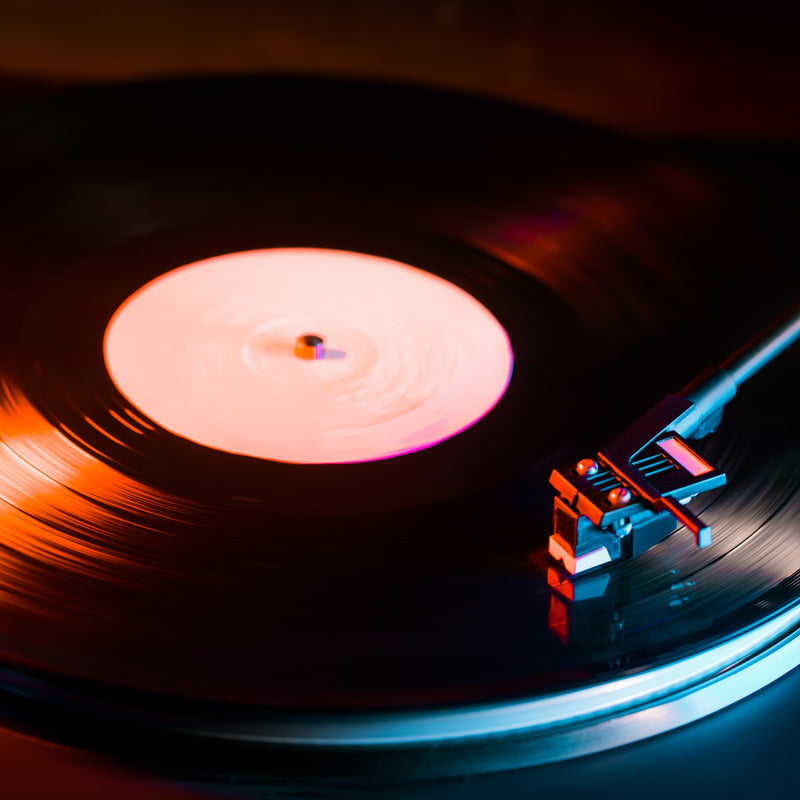 Close up shot of a vintage  stylus on a vinyl record