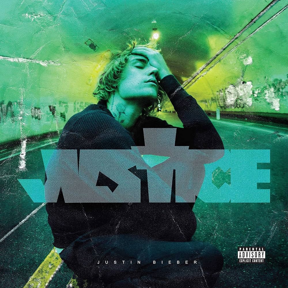 Justin Bieber - Justice Vinyl Record

Album cover with a person sitting on a ledge with a greenish tint, featuring the album title and artist name.