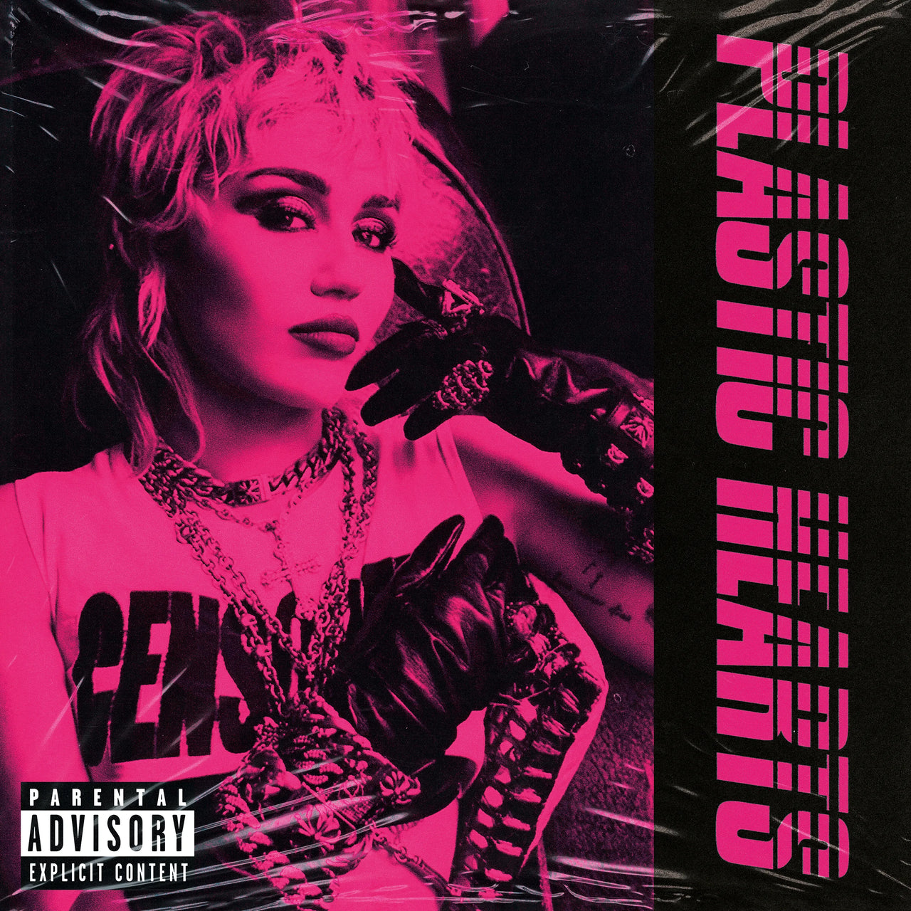 Miley Cyrus - Plastic Hearts Vinyl Record

Album cover with a person wearing gloves and a 'GENIUS' shirt, with text and a parental advisory label.